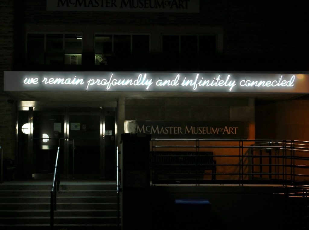 Hiba Abdallah neon art installation on front of Museum building, view from October 2020.