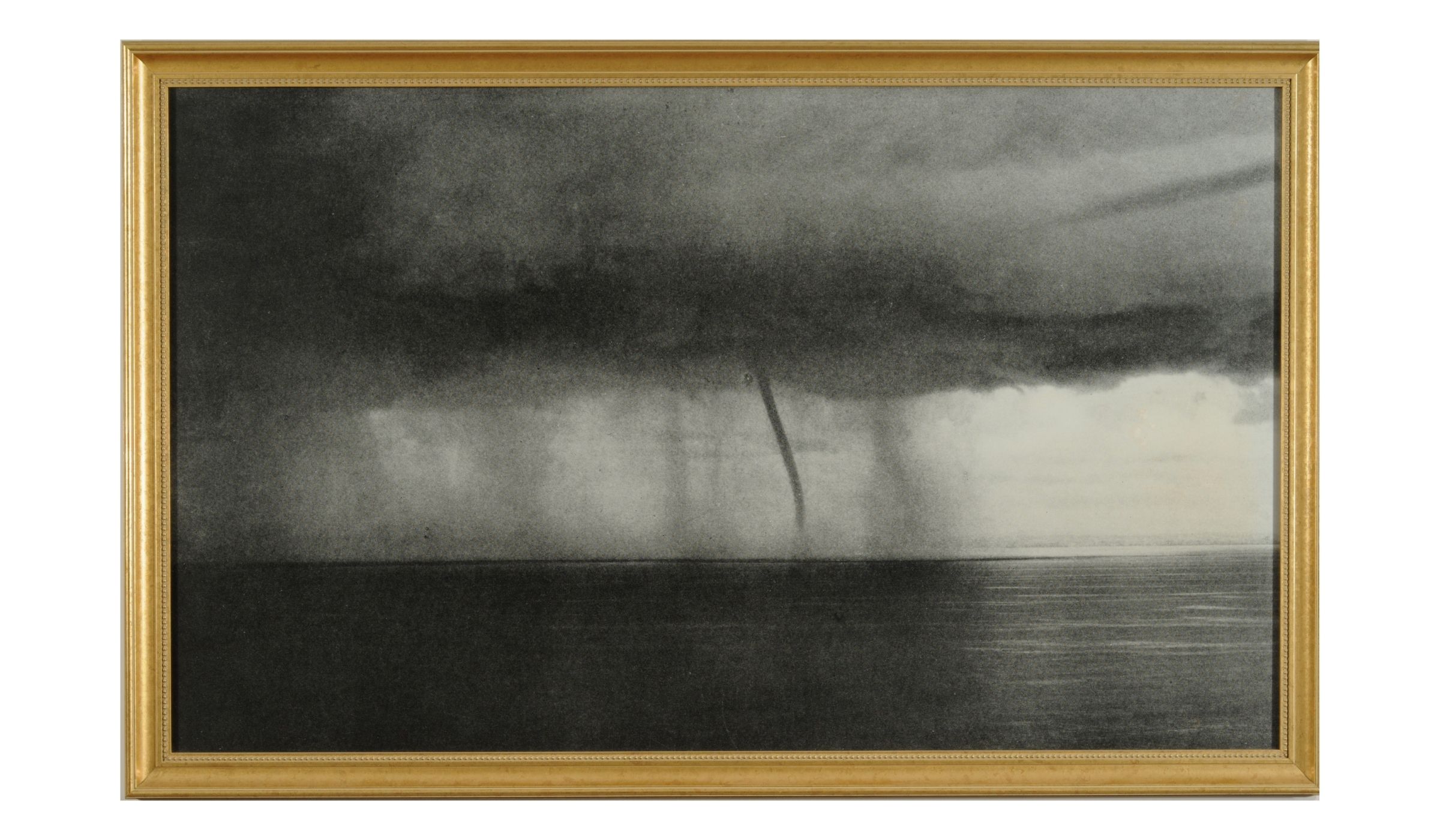 Black and white image or hurricane in gold frame