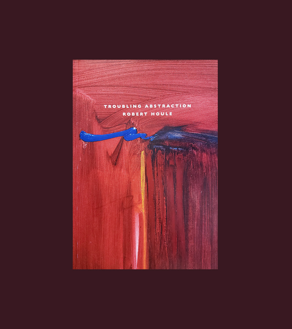 Book cover with image of abstract red and blue painting