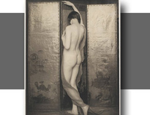 greyscale image of a nude woman from the back in between two tall cabinets