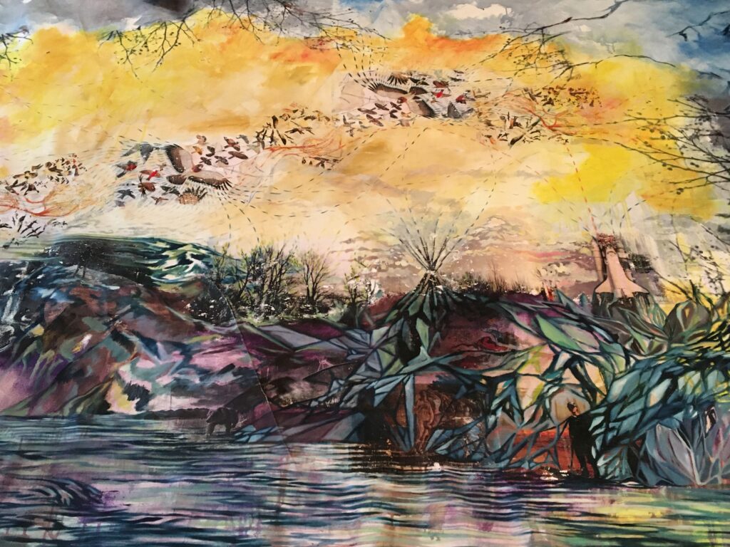 Multi coloured painting of a body of water with marshland, and a yellow sky above with birds