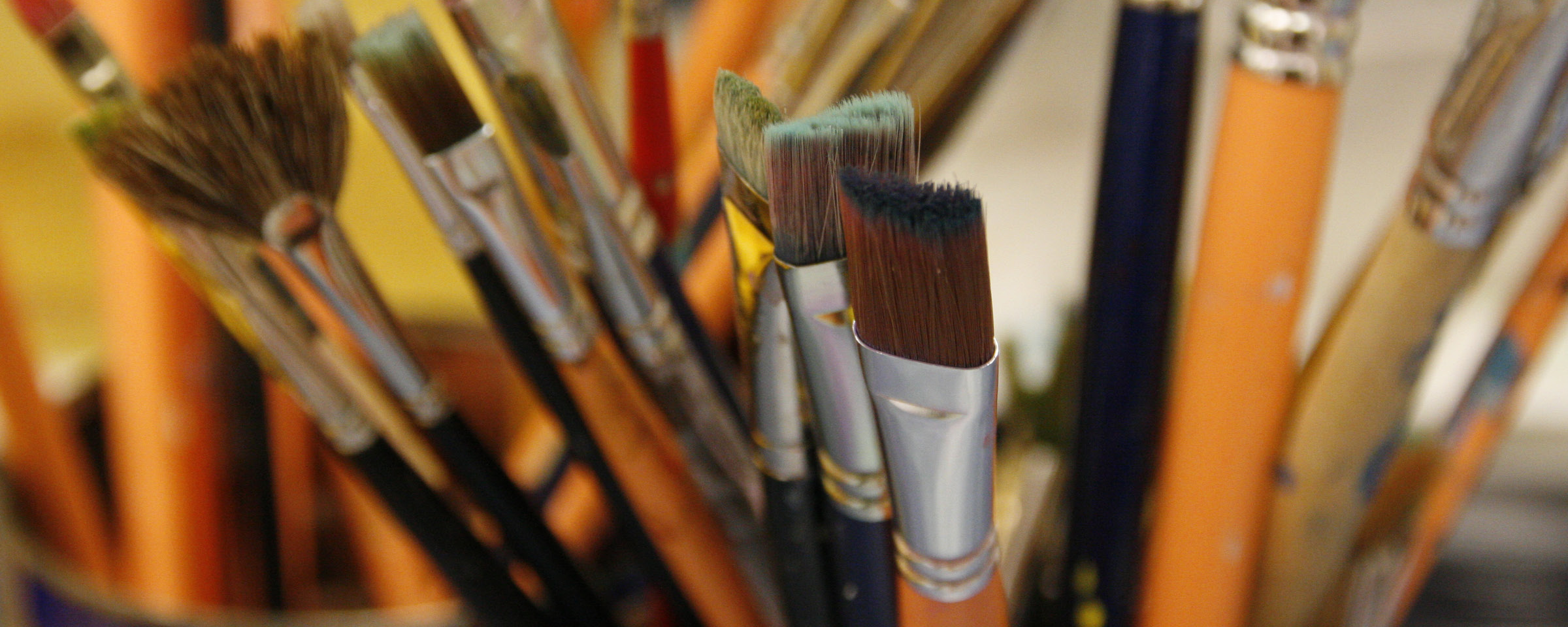 Warm photograph of paintbrushes