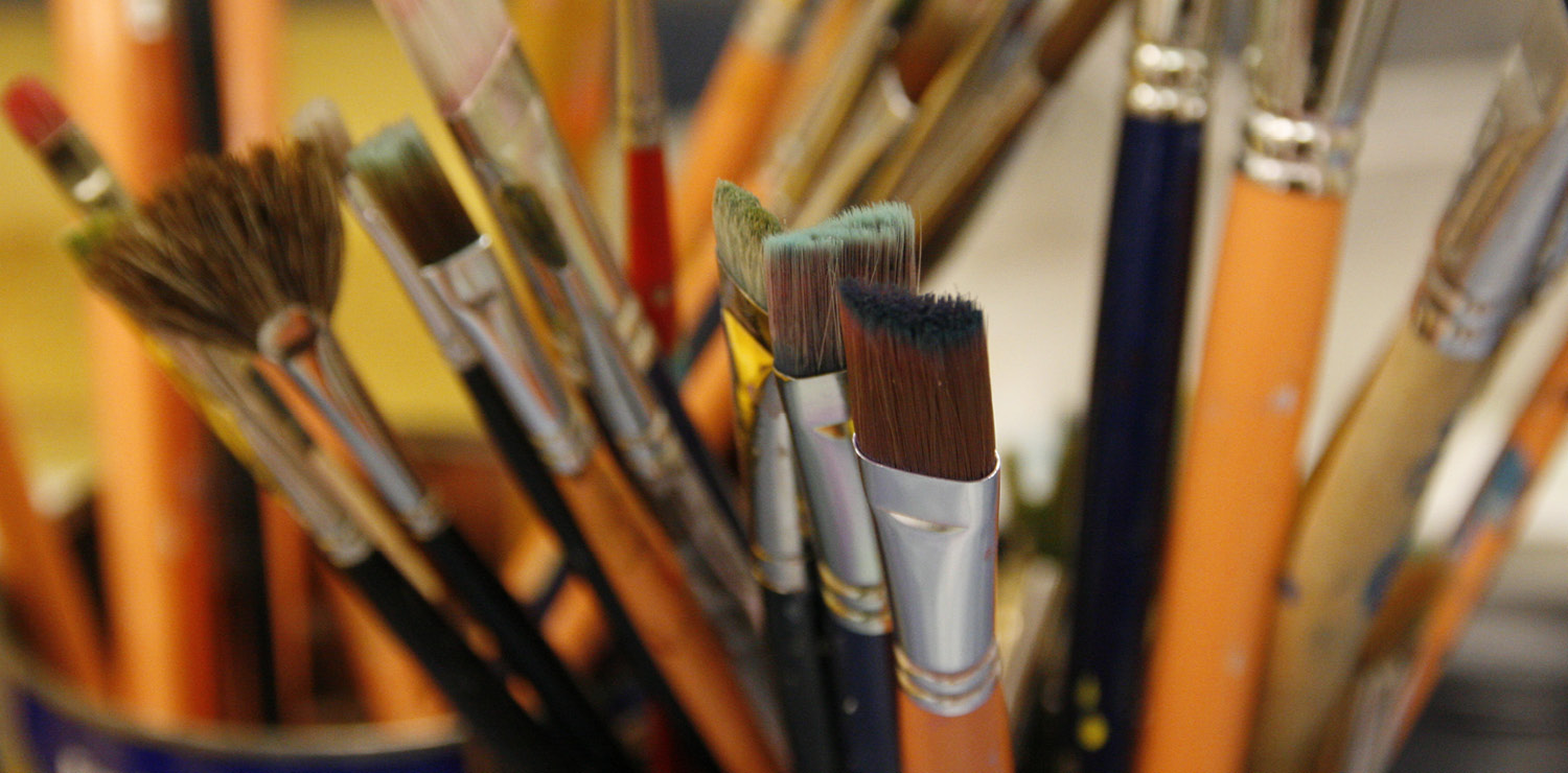 Warm photograph of paintbrushes